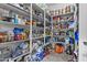 Spacious pantry with lots of shelving space and tile flooring, ideal for organization at 21337 E Waverly Dr, Queen Creek, AZ 85142