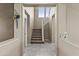 Staircase with neutral carpet, leading to the upper level of the house and natural light at 21337 E Waverly Dr, Queen Creek, AZ 85142