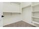 Bright walk-in closet featuring multiple hanging rods and ample shelf space for optimal storage and organization at 21337 E Waverly Dr, Queen Creek, AZ 85142