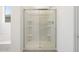All white shower with built in shelves at 22502 W Tonopah Dr, Surprise, AZ 85387