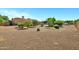 Open backyard with desert landscaping at 2300 E Sanoque Ct, Gilbert, AZ 85298