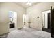 Large bedroom showcasing ensuite bathroom and closet at 2300 E Sanoque Ct, Gilbert, AZ 85298