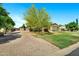 Beautiful home with well-manicured lawn and a charming driveway, perfect for suburban living at 2300 E Sanoque Ct, Gilbert, AZ 85298