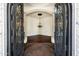 Inviting foyer with decorative tile flooring and elegant chandelier at 2300 E Sanoque Ct, Gilbert, AZ 85298