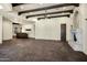 Spacious living room with fireplace, beamed ceilings, and tiled floors at 2300 E Sanoque Ct, Gilbert, AZ 85298