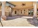 Spacious outdoor living area featuring a spiral staircase and ample room for entertaining at 2300 E Sanoque Ct, Gilbert, AZ 85298