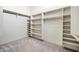Bright walk-in closet with shelves and railing at 2300 E Sanoque Ct, Gilbert, AZ 85298
