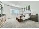 Primary bedroom showcasing a four-poster bed, neutral decor, and natural light at 23038 E Nightingale Rd, Queen Creek, AZ 85142