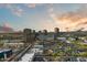 Stunning aerial view of the Phoenix skyline at sunset with a mix of modern high-rises and low-rise buildings at 2323 N Central Ave # Ph D, Phoenix, AZ 85004