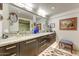 Bathroom with double sinks, marble countertops, and modern fixtures and decor at 2323 N Central Ave # Ph D, Phoenix, AZ 85004