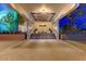 Elegant building entrance with modern architectural details, landscaped planters, and ambient lighting at 2323 N Central Ave # Ph D, Phoenix, AZ 85004