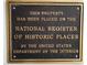 Close-up of a plaque indicating the property is listed on the National Register of Historic Places at 2323 N Central Ave # Ph D, Phoenix, AZ 85004