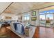 Open-concept living room with modern furnishings, hardwood floors, and a view at 2323 N Central Ave # Ph D, Phoenix, AZ 85004
