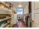 Walk-in closet with custom shelving, plenty of storage, and a city view at 2323 N Central Ave # Ph D, Phoenix, AZ 85004
