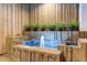 Unique water feature with decorative tilework and lush greenery creating a serene and inviting atmosphere at 2323 N Central Ave # Ph D, Phoenix, AZ 85004