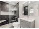 Modern bathroom featuring a glass-enclosed shower, stylish vanity, and contemporary fixtures at 2327 E Pebble Beach Dr, Tempe, AZ 85282