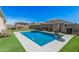 Inviting backyard pool with a gazebo, lounge chairs, perfect for outdoor entertaining and relaxation at 235 S 190Th Ave, Buckeye, AZ 85326