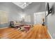 Bright living room with vaulted ceilings and hardwood flooring at 2454 W Camp River Rd, Queen Creek, AZ 85144