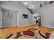 Bright living room with vaulted ceilings and hardwood flooring at 2454 W Camp River Rd, Queen Creek, AZ 85144