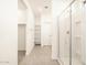 Modern bathroom featuring a glass-enclosed shower and built-in shelves at 2668 E San Miguel Dr, Casa Grande, AZ 85194