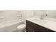 Sparkling bathroom with a white vanity, modern fixtures, and a combined tub and shower with tile surround at 2668 E San Miguel Dr, Casa Grande, AZ 85194