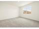 Neutral bedroom with a window that provides great natural light at 2668 E San Miguel Dr, Casa Grande, AZ 85194
