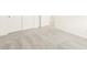 Spacious bedroom featuring plush gray carpeting, white walls, and a closet with white doors at 2668 E San Miguel Dr, Casa Grande, AZ 85194