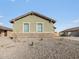 Charming single-story home with a well-maintained, low maintenance front yard on a sunny day at 2668 E San Miguel Dr, Casa Grande, AZ 85194