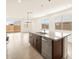 Bright kitchen with stainless steel appliances, granite countertops and island at 2668 E San Miguel Dr, Casa Grande, AZ 85194