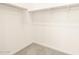 Bright walk-in closet with ample storage space and neutral carpet at 2668 E San Miguel Dr, Casa Grande, AZ 85194