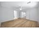 Bedroom with hardwood floors, recessed lighting and open doorway at 2831 W Margy Ct, Phoenix, AZ 85017