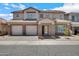 Charming two-story home featuring a three-car garage and a well-maintained, xeriscaped front yard for low maintenance at 2831 W Margy Ct, Phoenix, AZ 85017