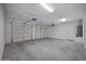 Spacious two car garage with overhead lighting, garage door openers, and plenty of room for storage at 2831 W Margy Ct, Phoenix, AZ 85017