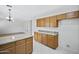 Open kitchen with stainless steel appliances, granite countertops, and convenient bar seating at 2831 W Margy Ct, Phoenix, AZ 85017