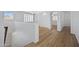 Upstairs landing with hardwood floors, ample natural light and multiple bedrooms at 2831 W Margy Ct, Phoenix, AZ 85017