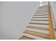 Beautiful staircase with wooden steps and a matching handrail at 2831 W Margy Ct, Phoenix, AZ 85017