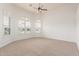 Bright and spacious bedroom with large windows and plush carpeting at 3001 E Winchcomb Dr, Phoenix, AZ 85032
