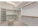 Spacious walk-in closet with custom shelving and lots of natural light at 3001 E Winchcomb Dr, Phoenix, AZ 85032