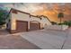 Spacious three car garage with ample parking and storage space at 3001 E Winchcomb Dr, Phoenix, AZ 85032