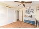 Bedroom has neutral decor and features a ceiling fan, and closet at 30013 N Candlewood Dr, San Tan Valley, AZ 85143