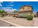 Residential home featuring desert landscaping, rock features and blue sky at 30013 N Candlewood Dr, San Tan Valley, AZ 85143