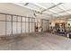 Spacious garage with ample storage cabinets and workbench area at 30013 N Candlewood Dr, San Tan Valley, AZ 85143