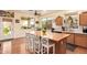 The spacious kitchen has an island with barstool seating and a sink with a view of the back yard at 30013 N Candlewood Dr, San Tan Valley, AZ 85143