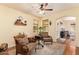 Cozy living room featuring hardwood floors, neutral walls, and natural light at 30013 N Candlewood Dr, San Tan Valley, AZ 85143