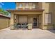 Inviting front porch with seating area and decorative elements, offers curb appeal at 30013 N Candlewood Dr, San Tan Valley, AZ 85143