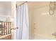 Shower with white shower curtain at 30013 N Candlewood Dr, San Tan Valley, AZ 85143