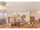 View of the wood staircase and railing leading to the second floor at 30013 N Candlewood Dr, San Tan Valley, AZ 85143