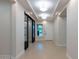 Bright foyer with neutral color palette, recessed lighting and large window with a view to the front yard at 3145 E Boot Track Trl, Gilbert, AZ 85296