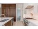 Modern kitchen featuring wood cabinets, stainless steel appliances and a functional layout at 3145 E Boot Track Trl, Gilbert, AZ 85296