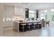 Spacious kitchen featuring a large island and barstool seating at 3145 E Boot Track Trl, Gilbert, AZ 85296